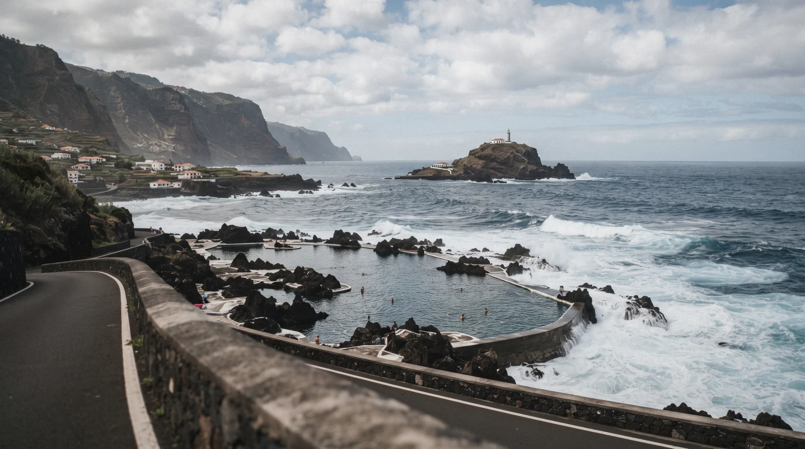 Swimmers in a seawater lava pool on the north coast, one of the best beaches in Madeira for a calm swim