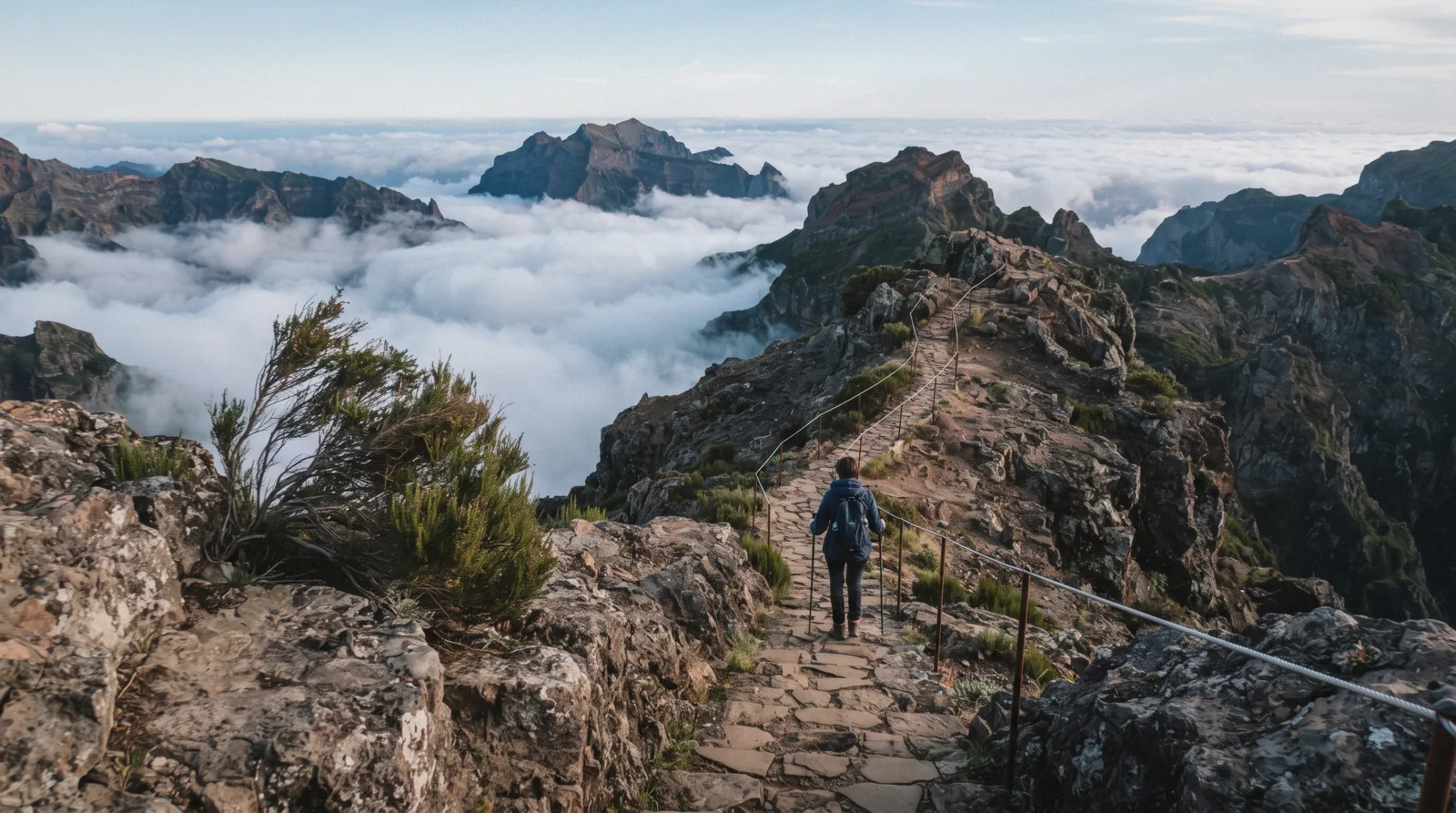 The ridge path at Pico do Areeiro above a sea of cloud in the early morning, the Madeira side of a Madeira vs Azores decision